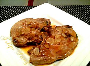 Foto principal de Chuletas de cerdo en salsa de ajos
