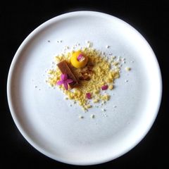 A picture of Deconstructed cocoa Mysore Pak, Mango Besan ladoo with Cashew Vanilla Crumb.