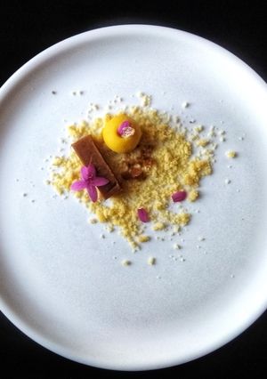 A picture of Deconstructed cocoa Mysore Pak, Mango Besan ladoo with Cashew Vanilla Crumb.