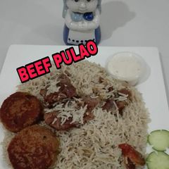A picture of Beef Pulao and Beef Boti Kabab.