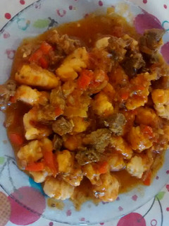 Una foto de Ñoquis de zanahoria y papa con salsa bolognesa