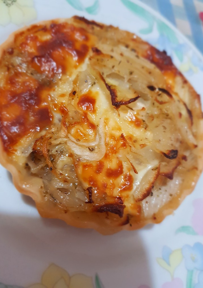 Una foto de Mini tartas de cebolla y Queso