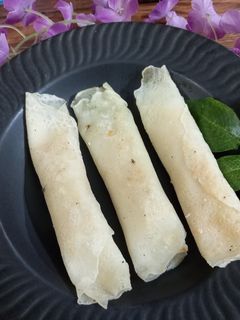 নারকেলের পুর দেওয়া পাটিসাপ্টা (narkeler pur dewa patishapta recipe in Bengali) রেসিপির প্রধান ছবি