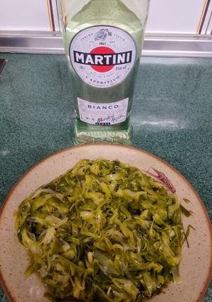Una foto de Ajos tiernos al Martini blanco 😋👌
