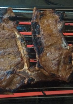 A picture of Grilled T bone steak.