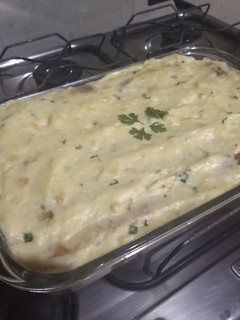 Foto de Panquecas recheadas e com molho branco