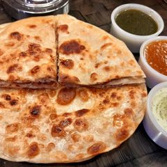 A picture of 🐔🐔Chicken cheese paratha🐔🐔.