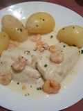 Lomos de merluza en salsa de cebolla con nata