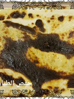 صورة لوصفة صينية البطاطس المحشيه باللحم المفروم وشرائح البيض المسلوق