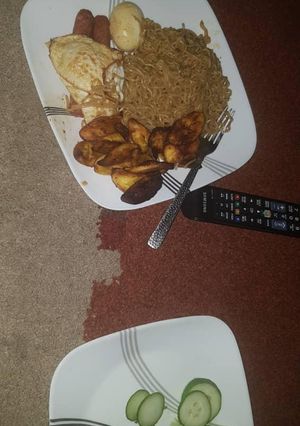 A picture of Noodles and fried plantain.