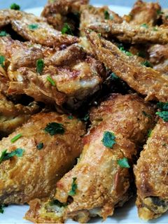 Una foto de Alitas de pollo Ras el Hanout en airfryer
