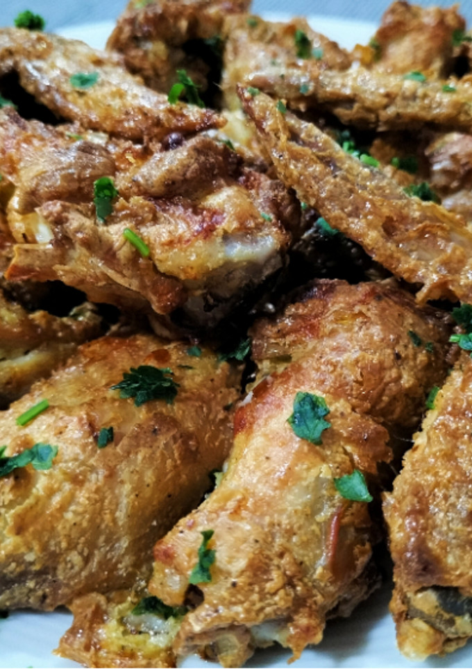 Una foto de Alitas de pollo Ras el Hanout en airfryer