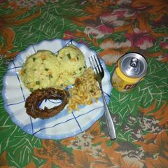 A picture of Cous cous with smoked fish.