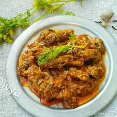 A picture of Coconut masala Doi patol.
