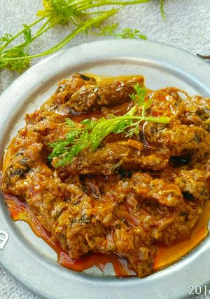 A picture of Coconut masala Doi patol.