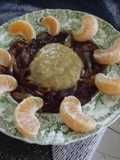 Guarnición de cebolla caramelizada y chipotle con puré de epazote y camote  al tequila