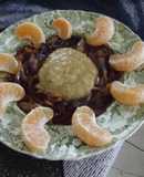 Guarnición de cebolla caramelizada y chipotle con puré de epazote y camote  al tequila