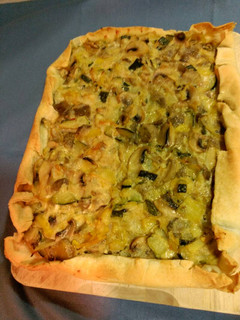 Una foto de Quiche de verduras y champiñones