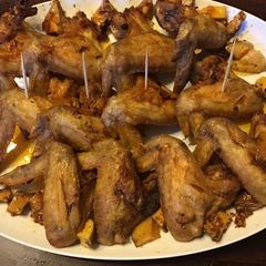 A picture of California Farm Teasmoked Chicken Wings with Pickled Mango.