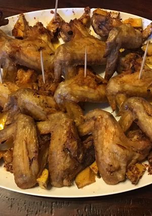 A picture of California Farm Teasmoked Chicken Wings with Pickled Mango.