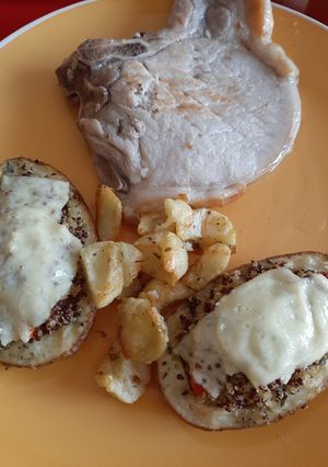 Una foto de Papa Canoa al Horno, Rellena con Quinoa roja y Blanca