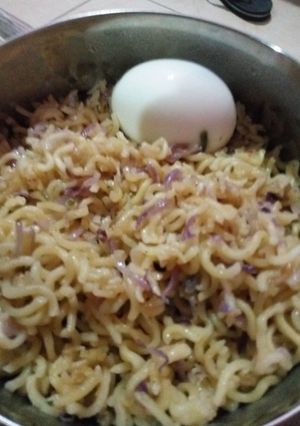 A picture of Fried Onion Spiced Indomie with Cook Egg #teamabuja.