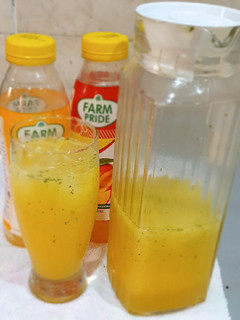 A picture of Orange mango refreshing drink.