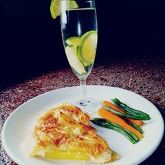 Zege,French beans & carrots along with lemon water A picture of Zege,French beans & carrots along with lemon water.