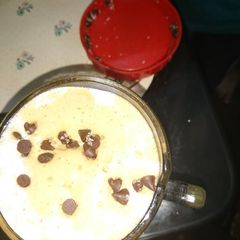 Coffee and chocolate bits in milk A picture of Coffee and chocolate bits in milk.