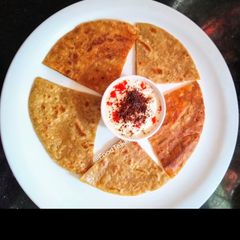 A picture of Chini(sugar) Paratha.