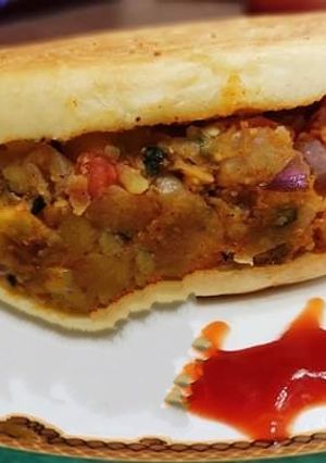 A picture of Chick Peas Paneer Stuffed Whole Wheat Bread Kulcha.
