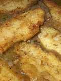 Merluza empanada en salsa americana
