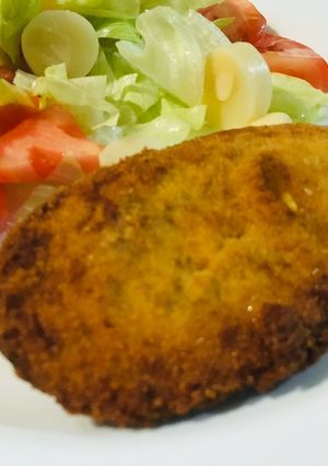 Una foto de Milanesa berenjenas