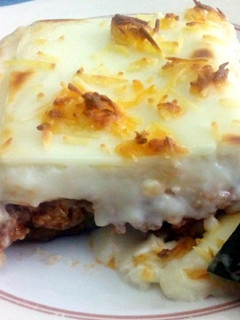 Una foto de Calabacín: Barquitas rellenas con bechamel al gratín