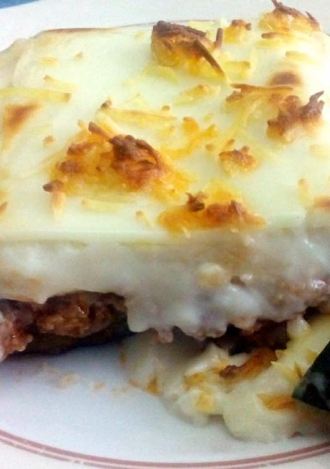 Una foto de Calabacín: Barquitas rellenas con bechamel al gratín