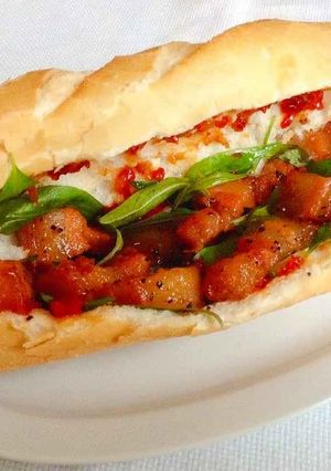 A picture of Bánh mì with Caramelized Pork - Huế Style.