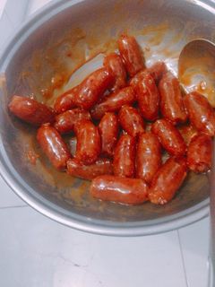 Hình của món Lạp Xưởng khô luộc dừa.
