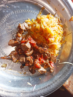 A picture of Simple steamed cabbages alongside fried liver.