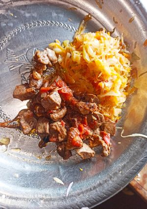 A picture of Simple steamed cabbages alongside fried liver.
