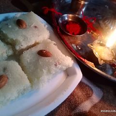 A picture of Nariyal mithai.