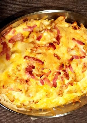 Una foto de Patatas con queso y bacon estilo Fosters Hollywood