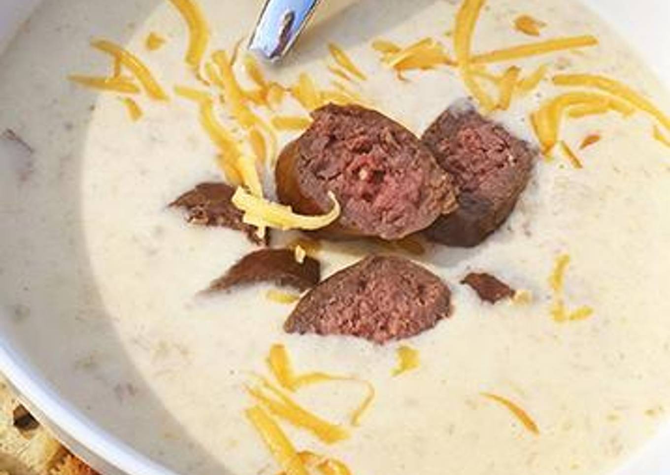 Oktoberfest Beer and Smoked Cheddar Soup with Fullblood Wagyu Beef Bratwurst