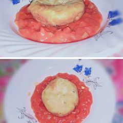 A picture of Deep fried yogart cake with pizza red sauce🍝melt in mouth😋.