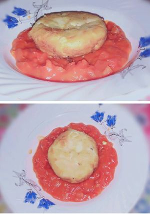 A picture of Deep fried yogart cake with pizza red sauce🍝melt in mouth😋.