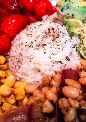A picture of Rice Bowl with Avocado, Corn, White Beans and Cherry Tomatoes (Vegan).