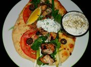 A picture of tzatziki with mint