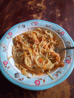 A picture of Spaghetti with vegetables.