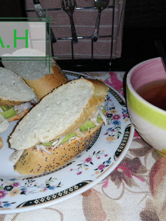 A picture of Chichen, avocado sandwich.