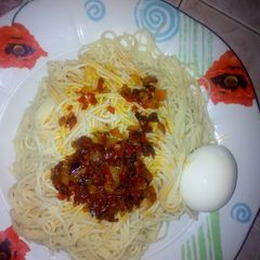 Palm oil sauce & spaghetti A picture of Palm oil sauce & spaghetti.