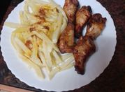 Una foto de alitas de pollo adobadas en airfryer